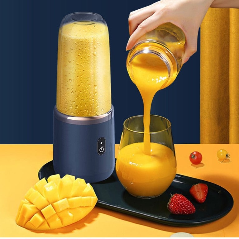 Bærbar elektrisk citruspresser med 6 blade - JuiceBoost™