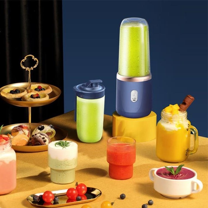 Bærbar elektrisk citruspresser med 6 blade - JuiceBoost™